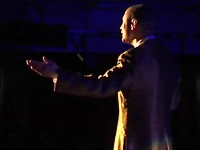 Calvin Hard standing Ovations